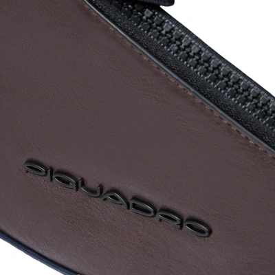 Рюкзак слинг Piquadro Harper CA6784AP/BLUTM синий/коричневый натур.кожа