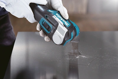 Многофункциональный инструмент Makita DTM52RTJX1 синий/черный