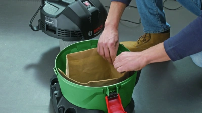 Строительный пылесос Bosch UniversalVac15 1000Вт (уборка: сухая/влажная/выдув) зеленый